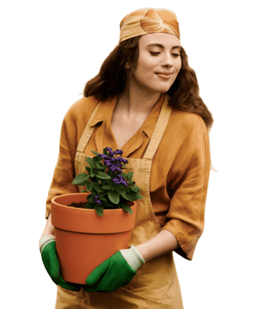 Customer holding a potted flowering plant