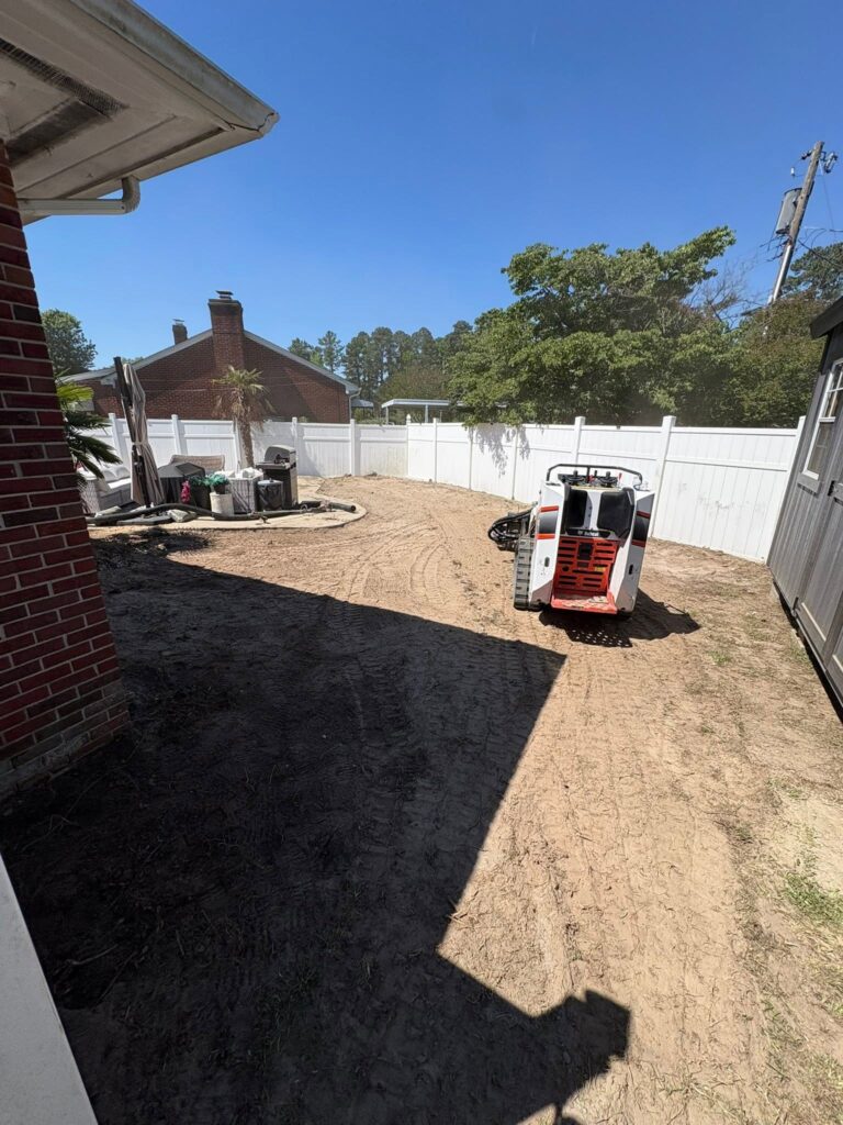 Backyard site preparation with equipment