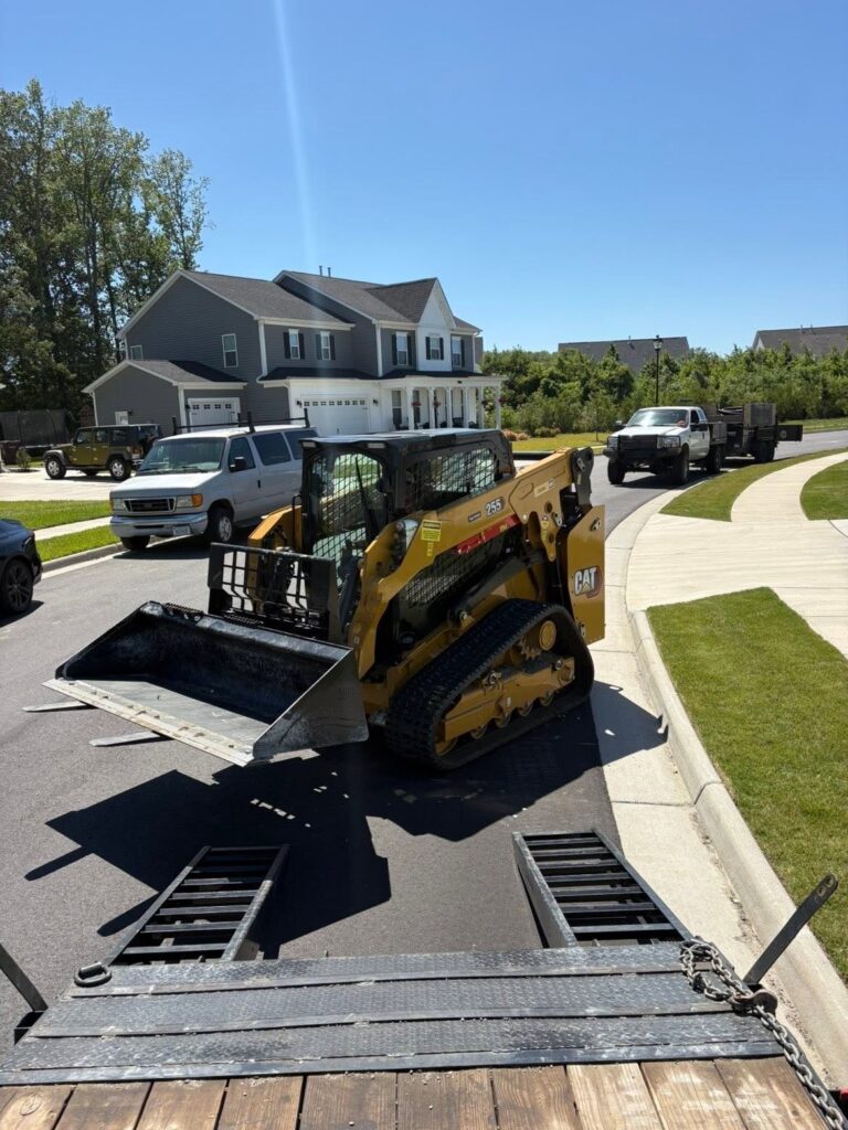 Skid steer working on a residential site