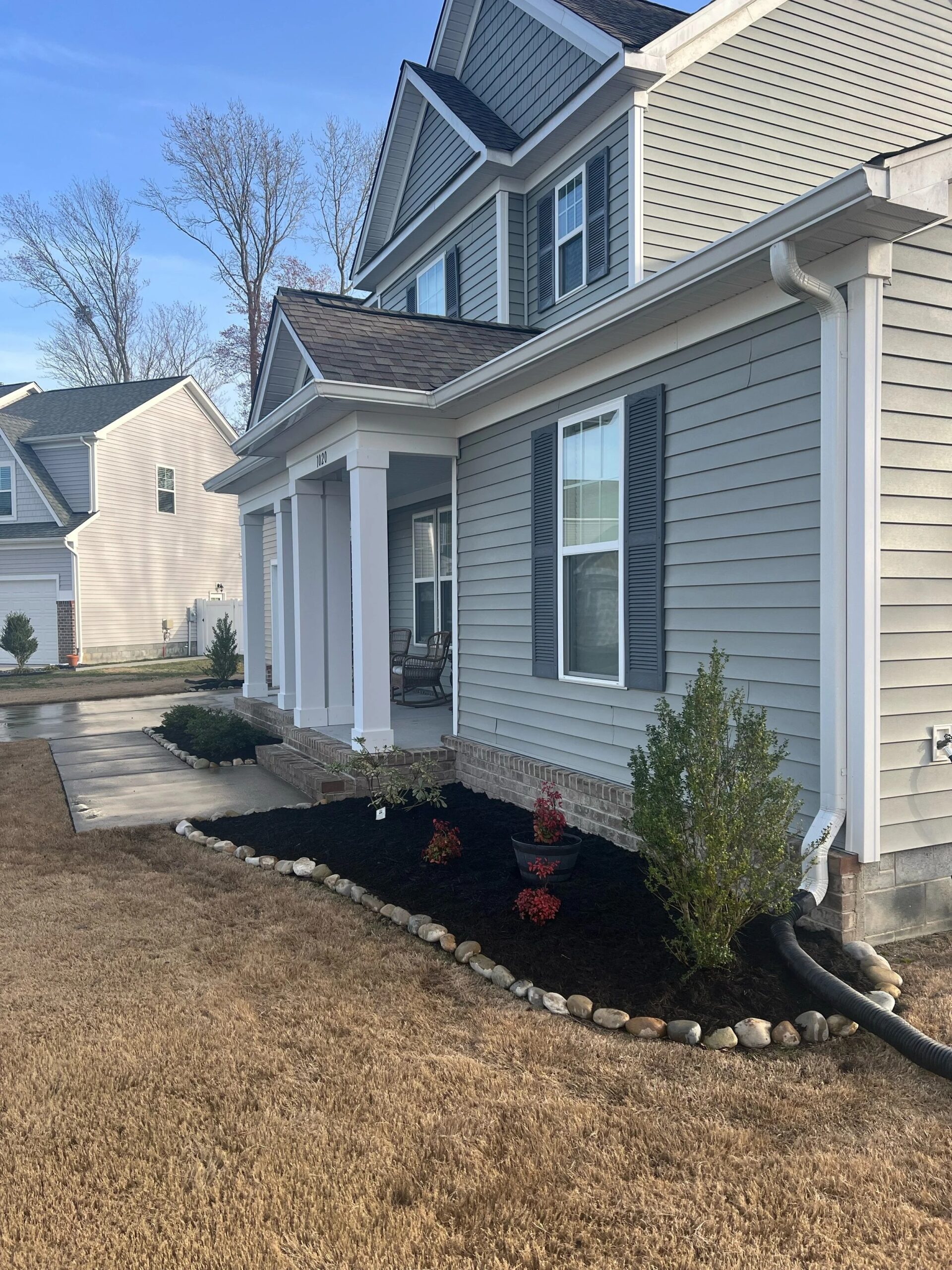 New foundation planting bed at a home