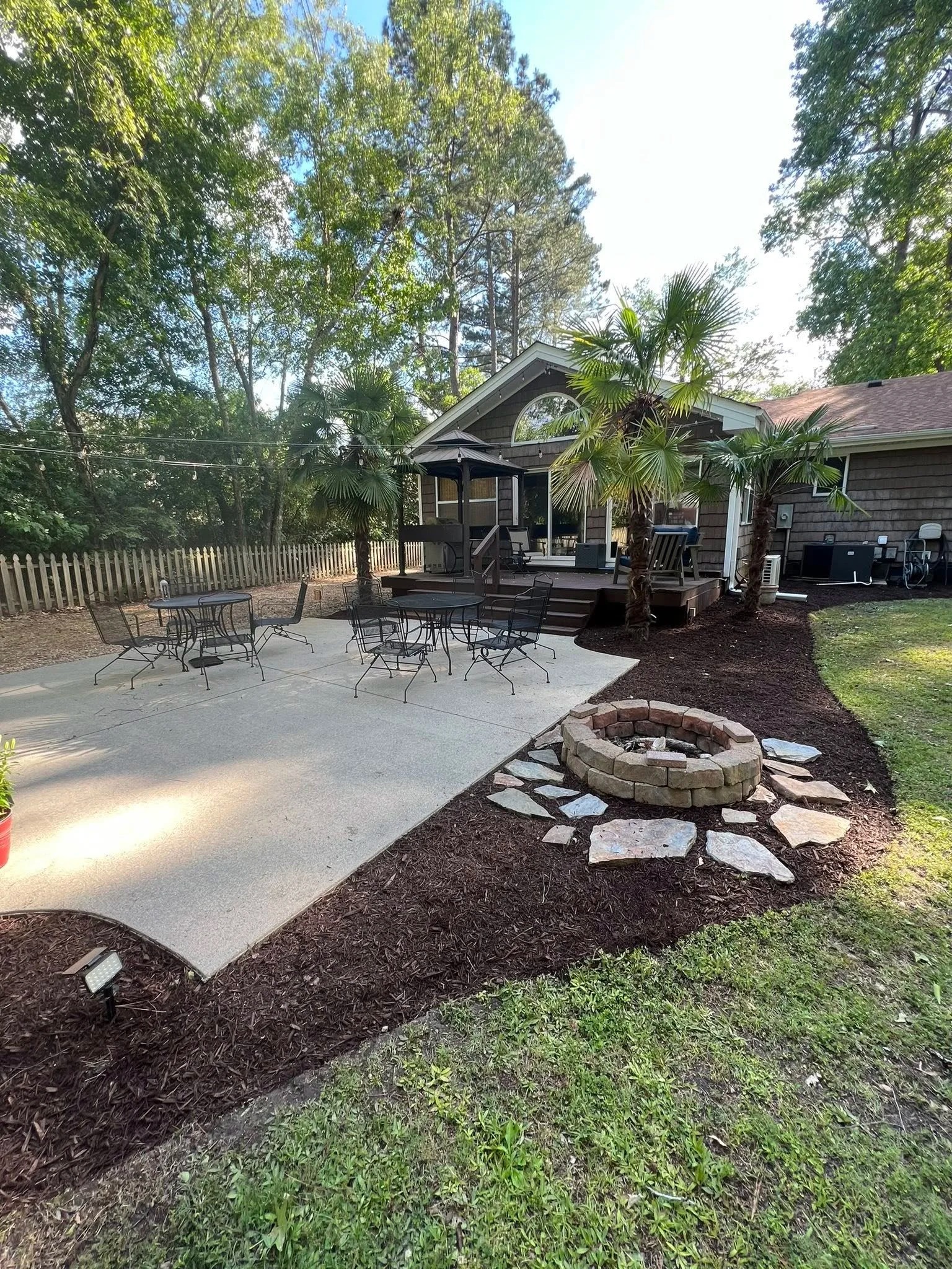 Concrete patio with fire pit area